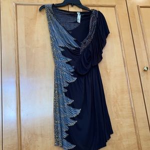 A never worn Free People Medium black dress ☘️☘️